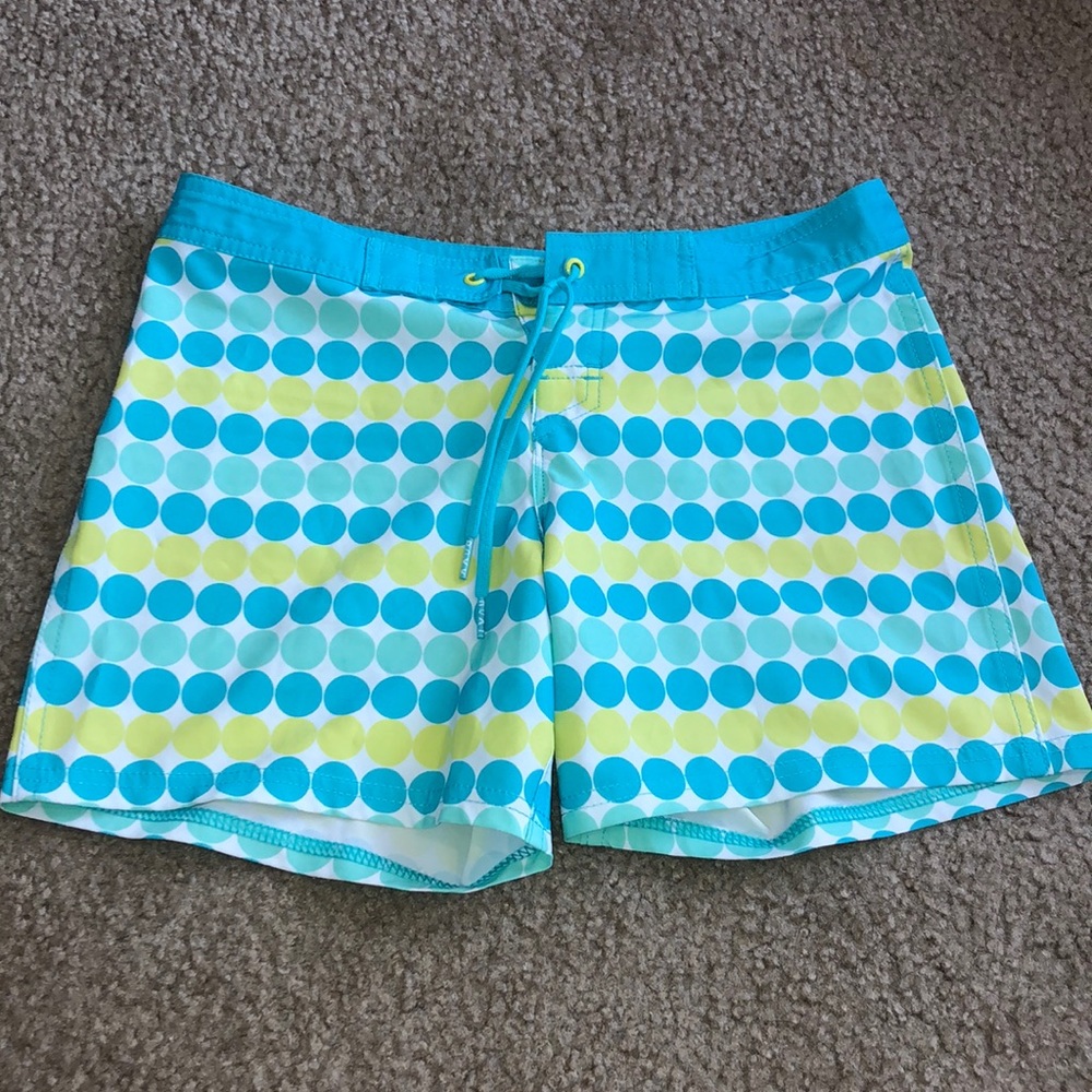 teal swimming trunks